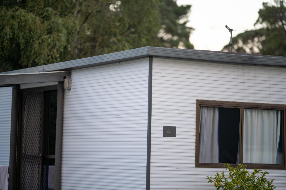 Siding contractor working on a home in East Hampton